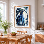 Blue haired witch and black cat cross stitch artwork displayed on wall as home decor
