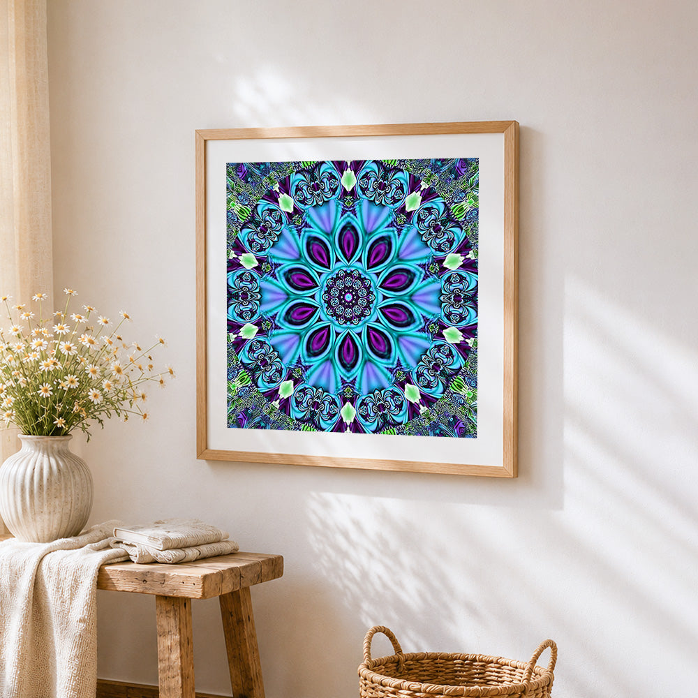 Blue kaleidoscope mandala cross stitch artwork displayed on wall as home decor