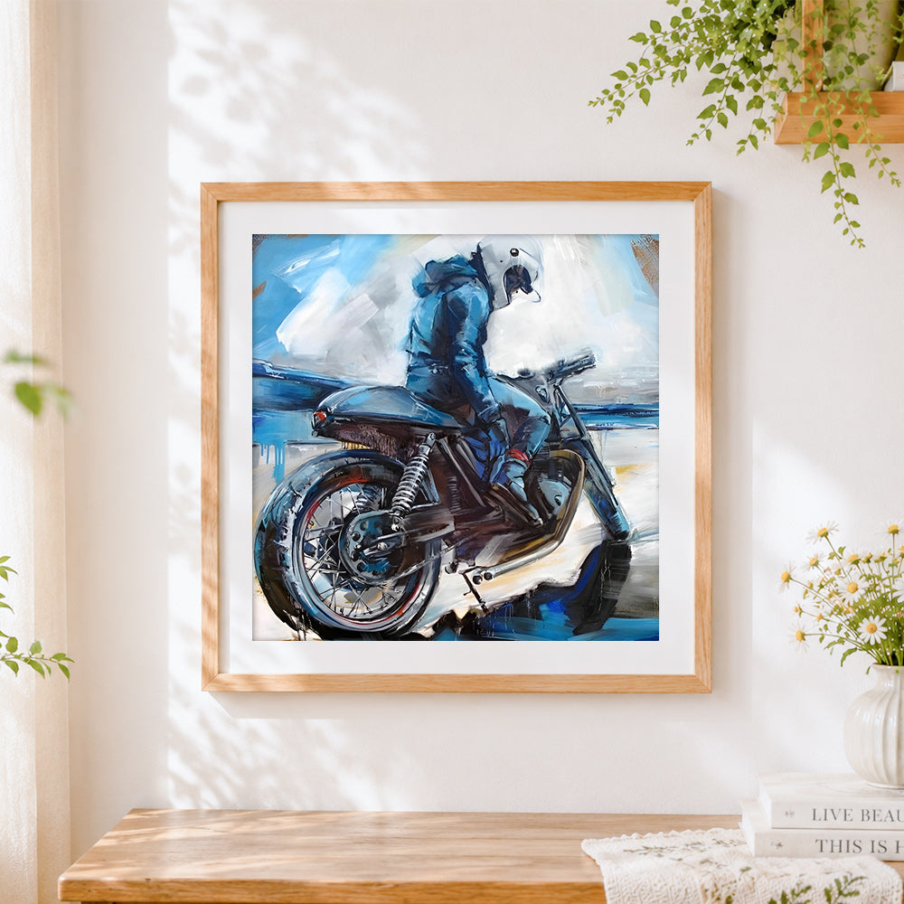 Finished blue motorcycle rider cross stitch artwork displayed
