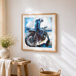 Blue motorcycle rider cross stitch artwork displayed on wall as home decor