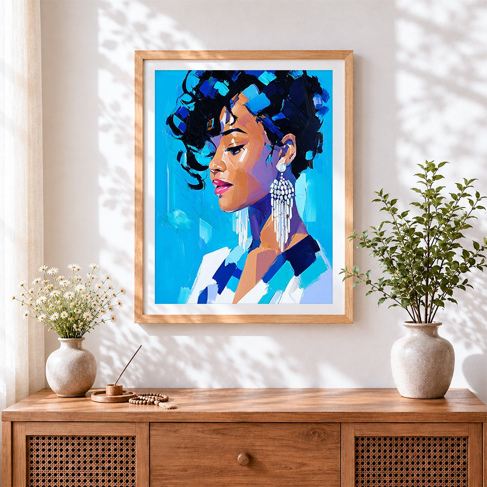 Finished blue portrait of a woman cross stitch artwork displayed