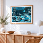 Blue sports car in rainy city cross stitch artwork displayed on wall as home decor