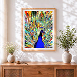Finished blue stained glass peacock cross stitch artwork displayed