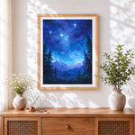 Finished blue starry night over snowy mountains cross stitch artwork displayed