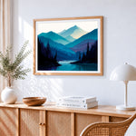 Blue toned mountains cross stitch artwork displayed on wall as home decor