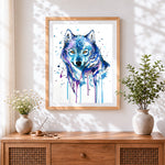Finished blue watercolour wolf cross stitch artwork displayed