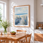 Blue wildflower path to the beach cross stitch artwork displayed on wall as home decor