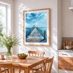 Blue wooden pier over calm ocean cross stitch artwork displayed on wall as home decor