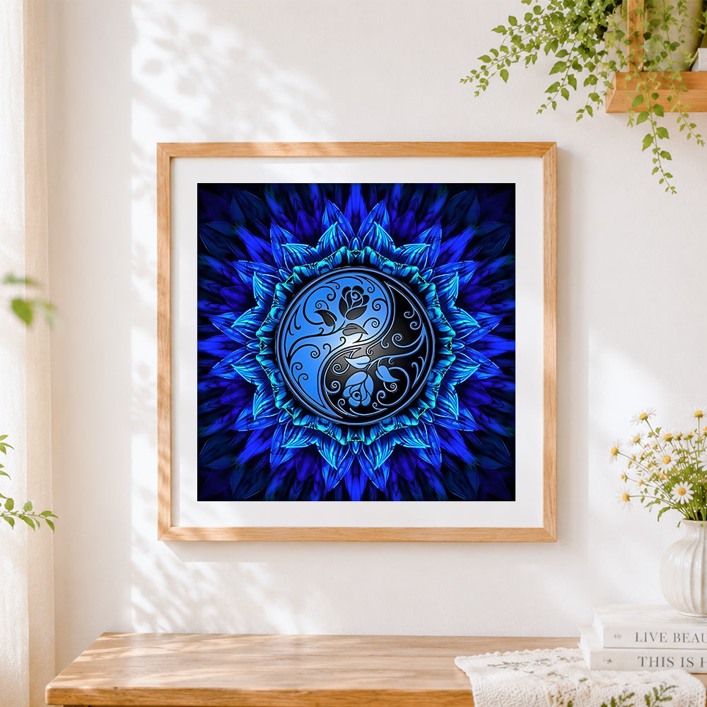 Finished blue yin yang mandala cross stitch artwork displayed