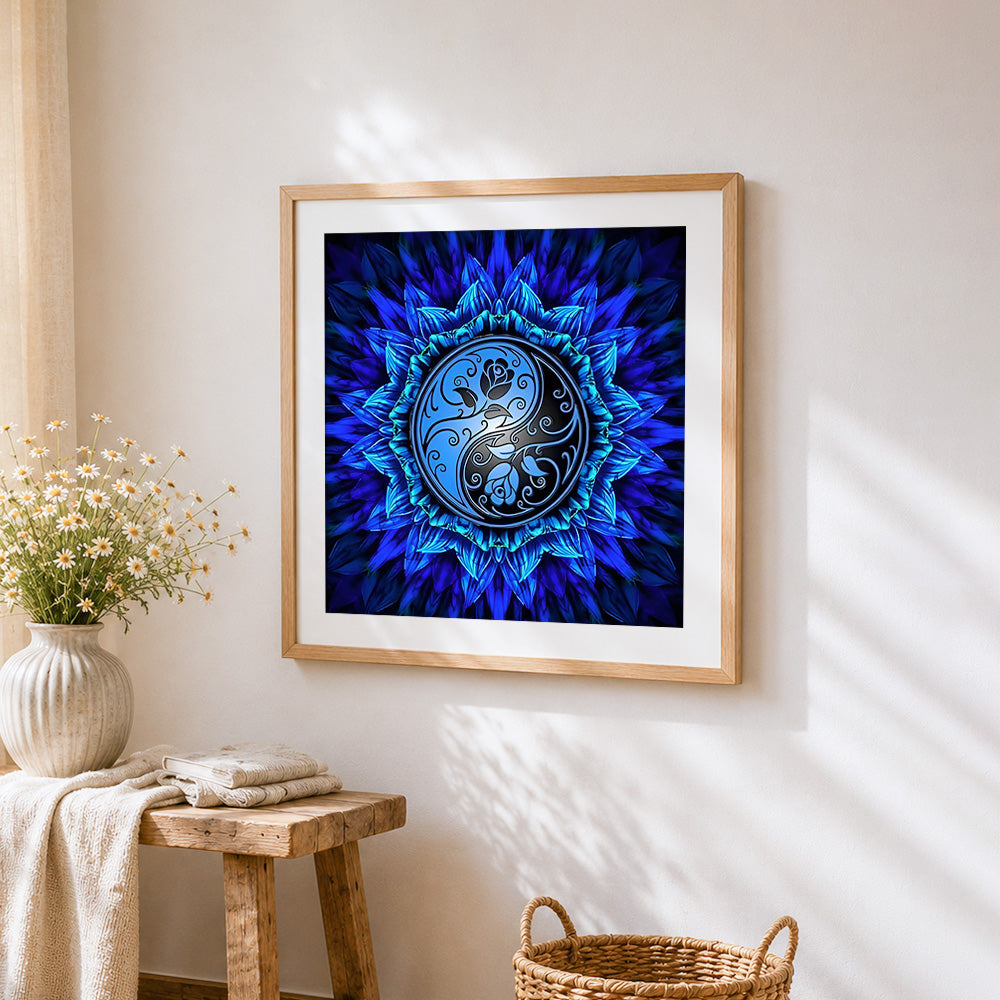 Blue yin yang mandala cross stitch artwork displayed on wall as home decor