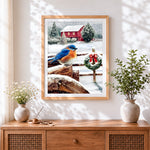 Finished bluebird on a snowy fence with wreath cross stitch artwork displayed
