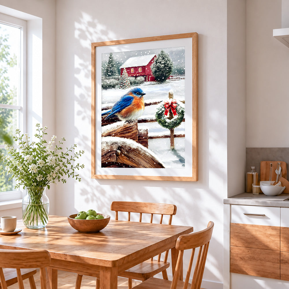 Bluebird on a snowy fence with wreath cross stitch artwork displayed on wall as home decor