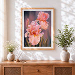 Finished blush pink irises cross stitch artwork displayed