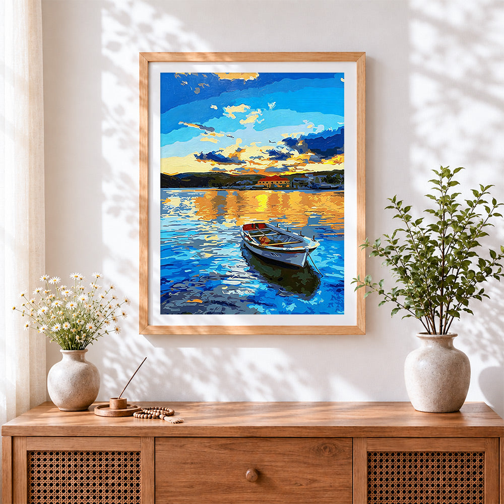 Finished boat on blue sea cross stitch artwork displayed