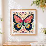 Finished bohemian butterfly cross stitch artwork displayed