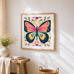 Bohemian butterfly cross stitch artwork displayed on wall as home decor