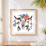 Finished boho floral bull skull cross stitch artwork displayed