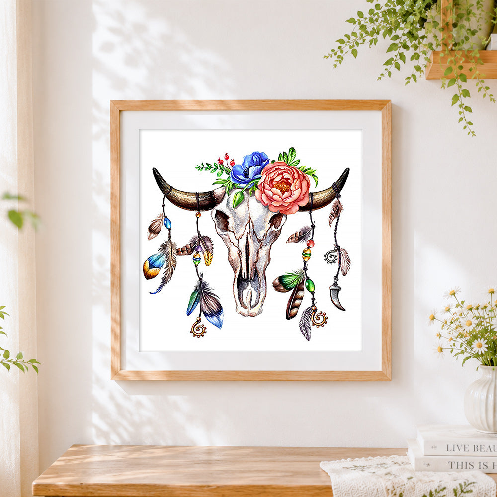 Finished boho floral bull skull cross stitch artwork displayed