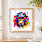 Finished bold pop art chimpanzee cross stitch artwork displayed