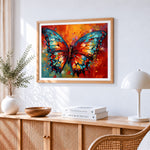 Bold red and blue abstract butterfly paint by numbers artwork displayed on wall as home decor