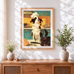 Finished border collie chef in kitchen cross stitch artwork displayed