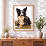 Finished border collie in wildflower meadow cross stitch artwork displayed