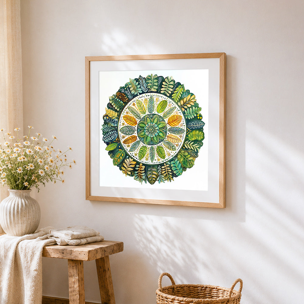 Botanical leaf mandala cross stitch artwork displayed on wall as home decor