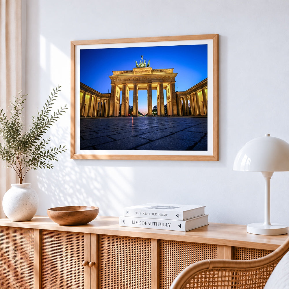 Brandenburg gate at blue hour cross stitch artwork displayed on wall as home decor