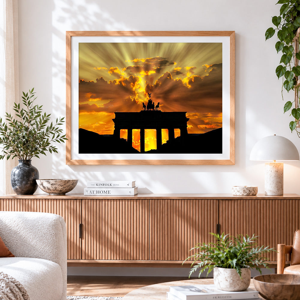 Finished brandenburg gate silhouette at sunset cross stitch artwork displayed