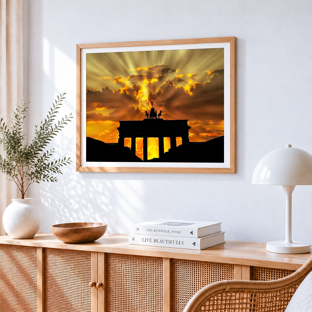 Brandenburg gate silhouette at sunset cross stitch artwork displayed on wall as home decor