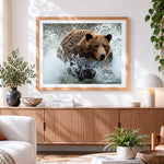 Finished brown bear in water cross stitch artwork displayed