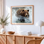 Brown bear in water cross stitch artwork displayed on wall as home decor