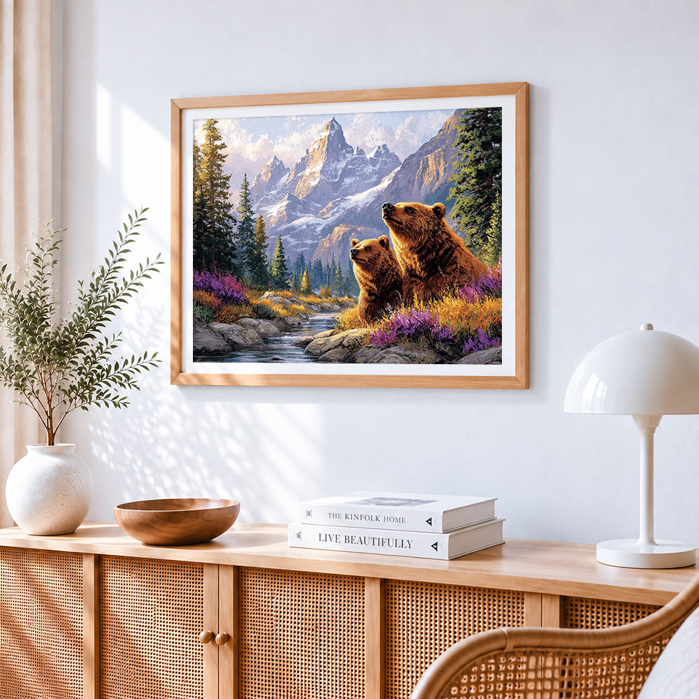 Brown bears in mountain stream cross stitch artwork displayed on wall as home decor