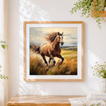 Finished brown horse galloping in a field cross stitch artwork displayed