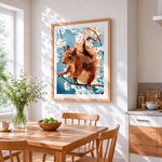 Brown squirrel and white blossom cross stitch artwork displayed on wall as home decor
