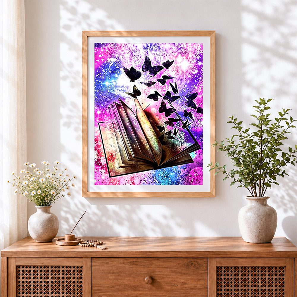 Finished butterflies flying from a book cross stitch artwork displayed