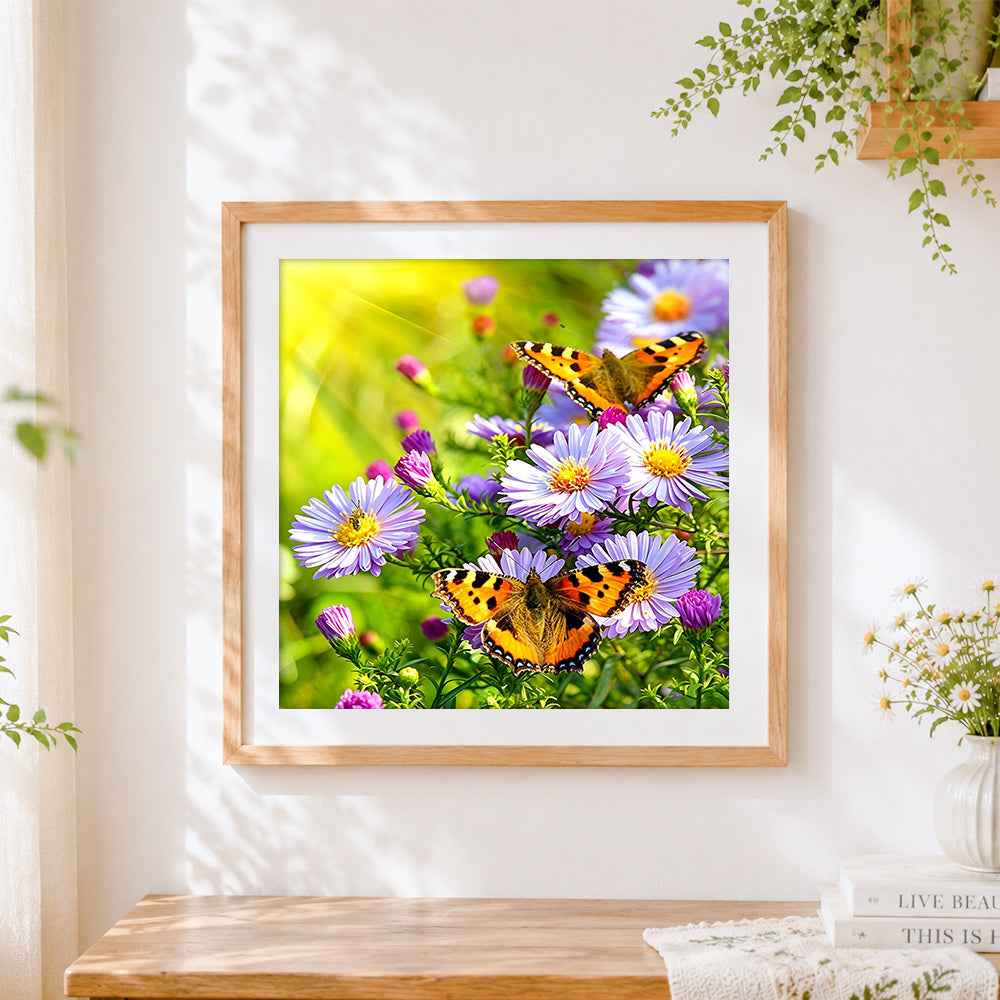 Finished butterflies on purple wildflowers cross stitch artwork displayed