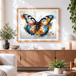 Finished butterfly in the style of ink splash cross stitch artwork displayed