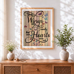 Finished butterfly quote on wood art cross stitch artwork displayed