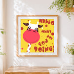 Finished cartoon cow greeting cross stitch artwork displayed
