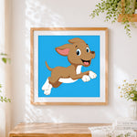 Finished cartoon dog running cross stitch artwork displayed