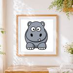 Finished cartoon hippo sitting cross stitch artwork displayed