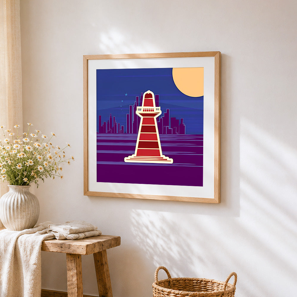 Cartoon lighthouse and city skyline at night cross stitch artwork displayed on wall as home decor