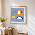 Cartoon orange excavator cross stitch artwork displayed on wall as home decor