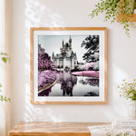 Finished castle reflection cross stitch artwork displayed