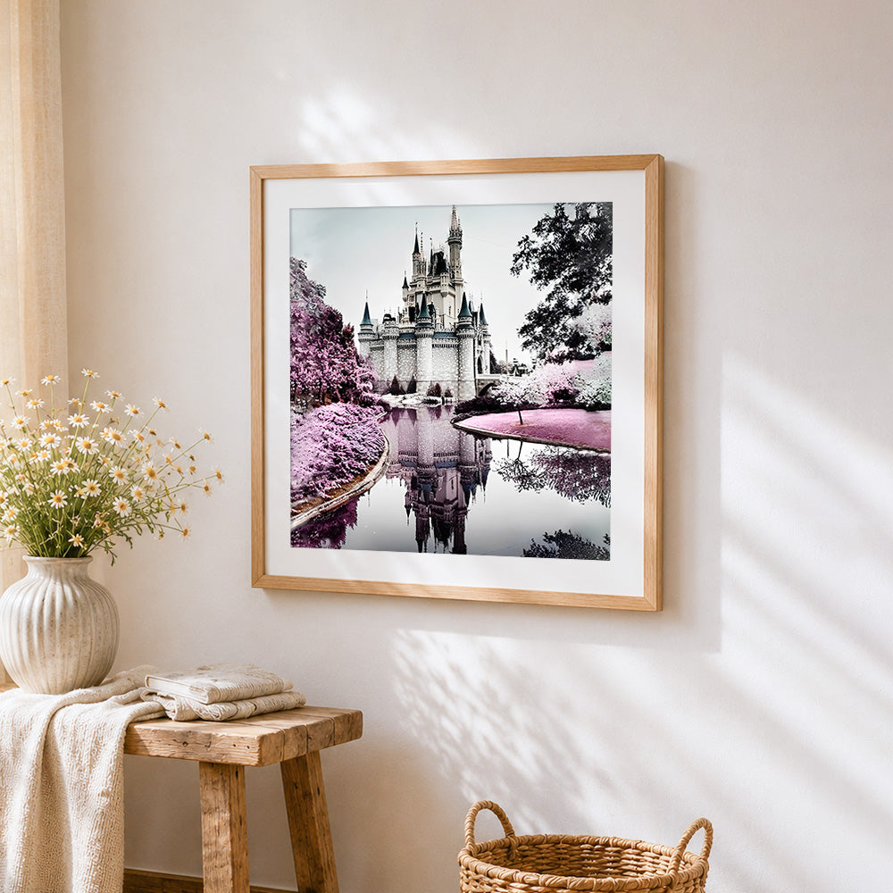 Castle reflection cross stitch artwork displayed on wall as home decor
