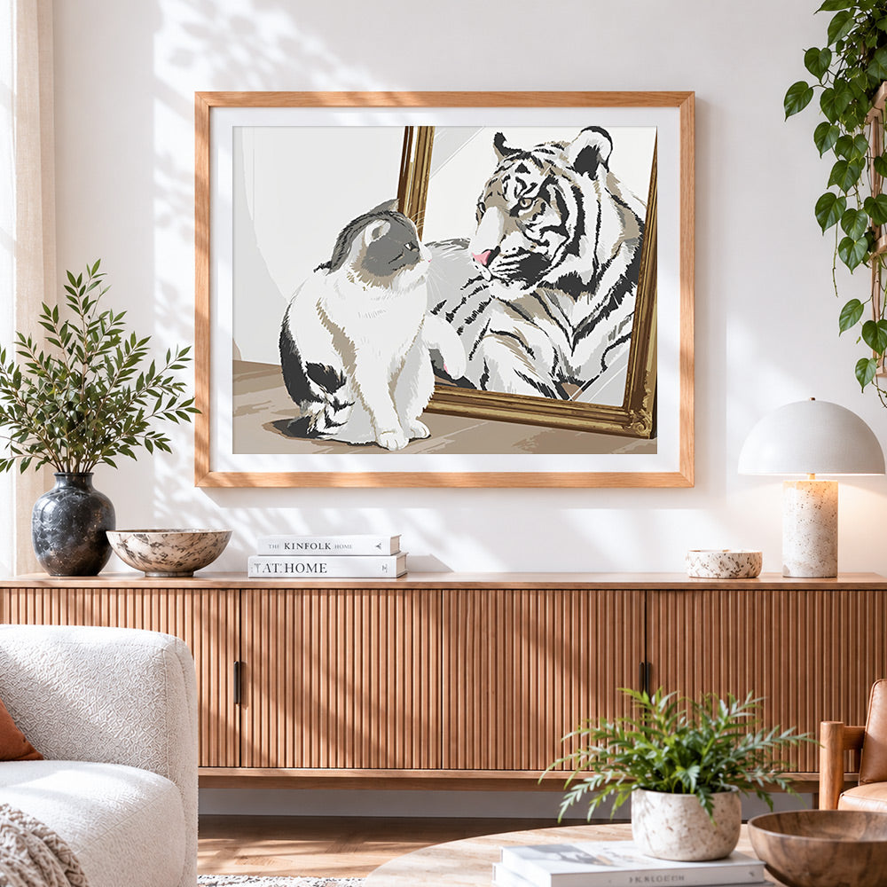 Finished cat and tiger in mirror cross stitch artwork displayed