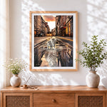 Finished cat and tiger reflection in city street cross stitch artwork displayed