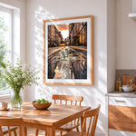 Cat and tiger reflection in city street cross stitch artwork displayed on wall as home decor