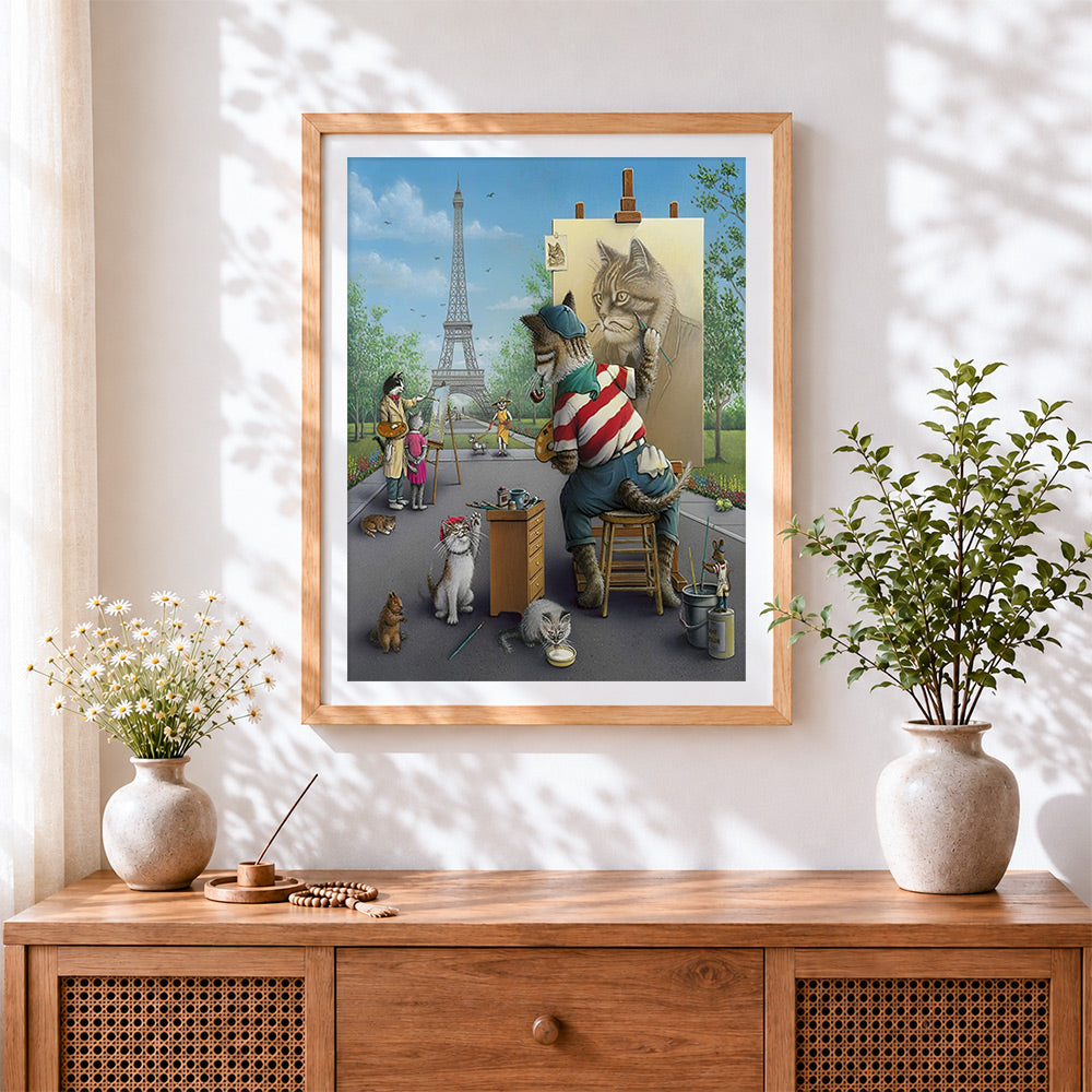 Finished cat artist in paris cross stitch artwork displayed